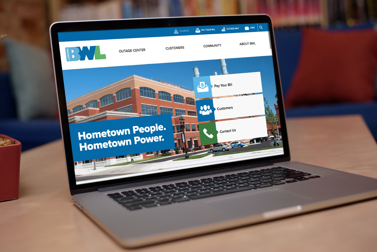 The BWL website homepage on a laptop