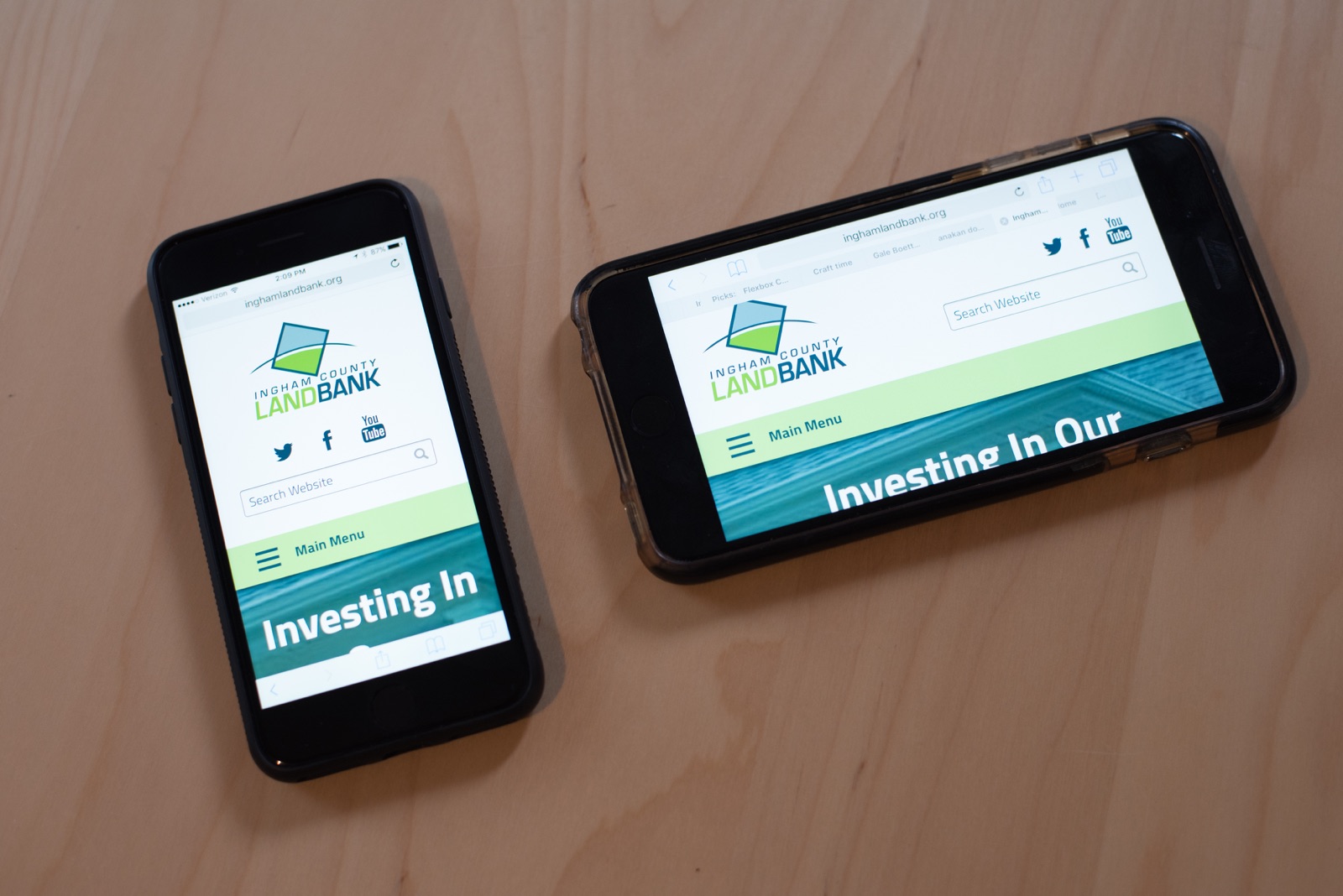 The Ingham County Land Bank website on multiple smartphones